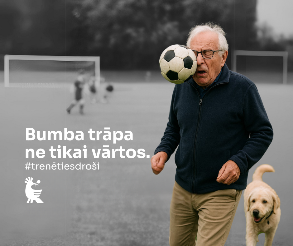 Opis, kuram sejā trāpa futbola bumba, staigā ar suni futbola laukumā