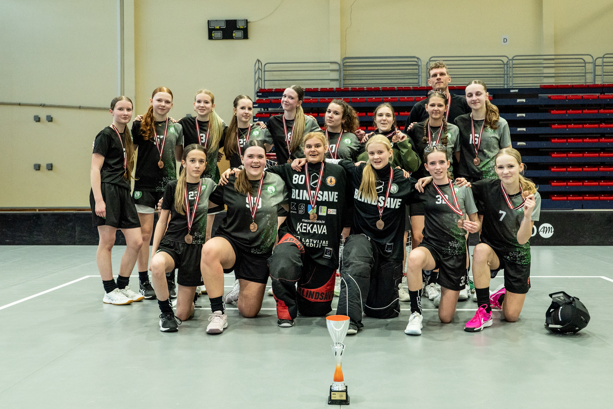 sporta komandas foto gaišā telpā