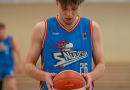 Basketbolisti sporta zālē