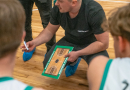 Basketbolisti sporta zālē