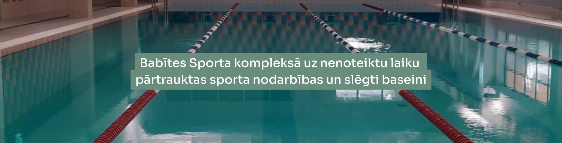 Baseins fonā un priekšplānā teksts