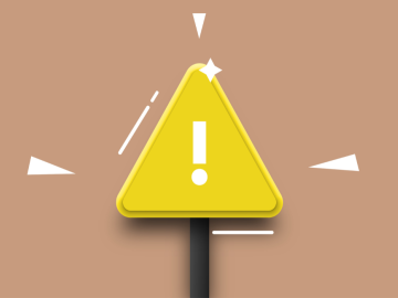 Brūns fons ar dzeltenu izsaukuma zīmi