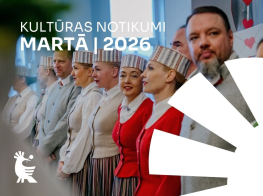 dejotāji stāv ierindā, tautas tērpos