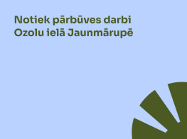 gaiši zils fons ar zaļu grafiku un tekstu